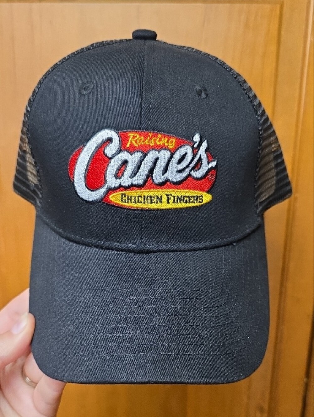 Raising Cane’s Chicken Fingers One Love Black Mesh Snapback Trucker Hat